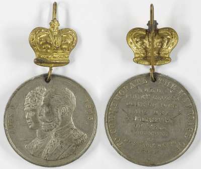 medallion commemorating the marriage of Prince George and Princess Mary