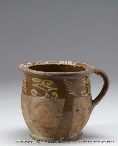 chamber pot with trailed slip decoration