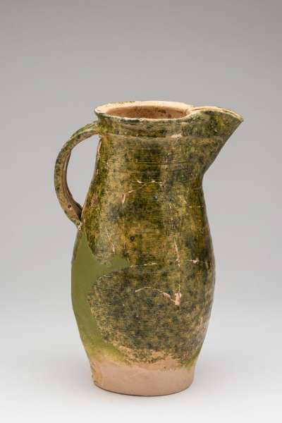 jug, green glazed, tall with complete base