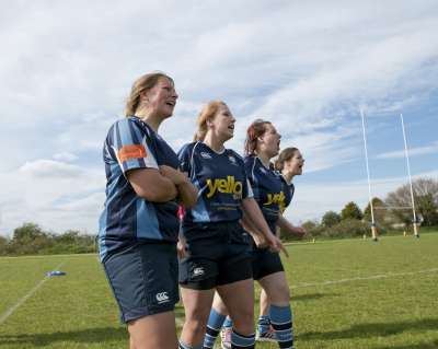 Touch-Line: Team Players. Topsham ladies Rugby Club. Match against Newton Abbot Ladies Rugby Team