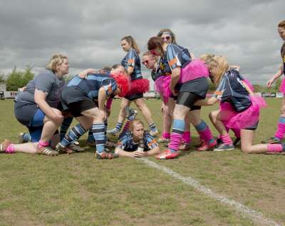 Touch-Line: Topsham Ladies Rugby Club team. Post match dressing up