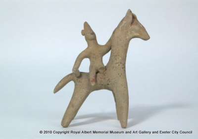 figurine of a horse and male rider