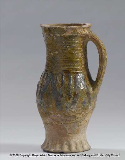 earthenware jug with metallic stripes