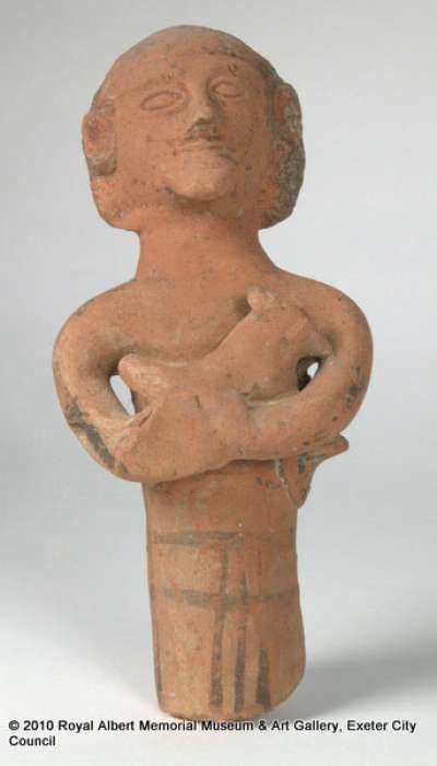 figurine of a man carrying an animal