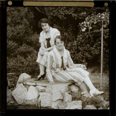 Lantern Slide: Two young women sitting in garden