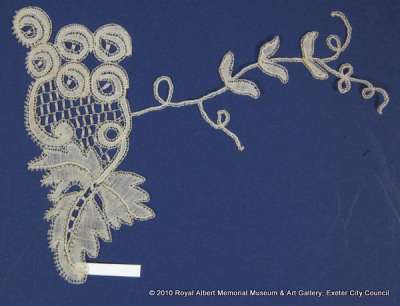 Honiton (East Devon) lace sprig with design of grapes and vine