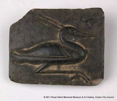 carving depicting benu bird (phoenix), fake?