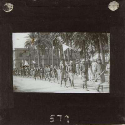 Lantern Slide: Group of Boy Scouts parading in street