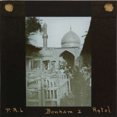 Lantern Slide: Street scene with gateway and mosque
