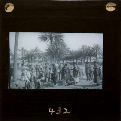 Lantern Slide: Group of local people and British soldiers