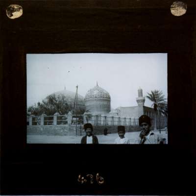 Lantern Slide: Three boys standing in front of mosque