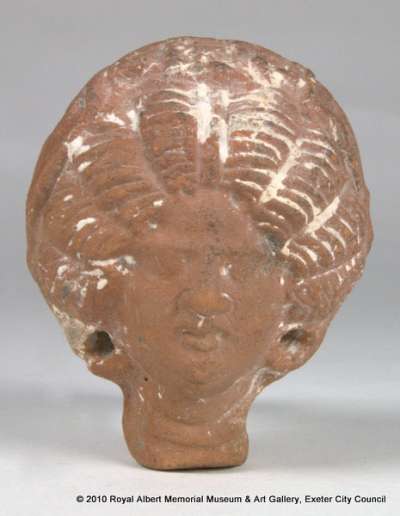 female head, votive figurine