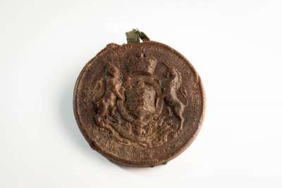 seal of George III with reverse showing mills crushing sugar canes